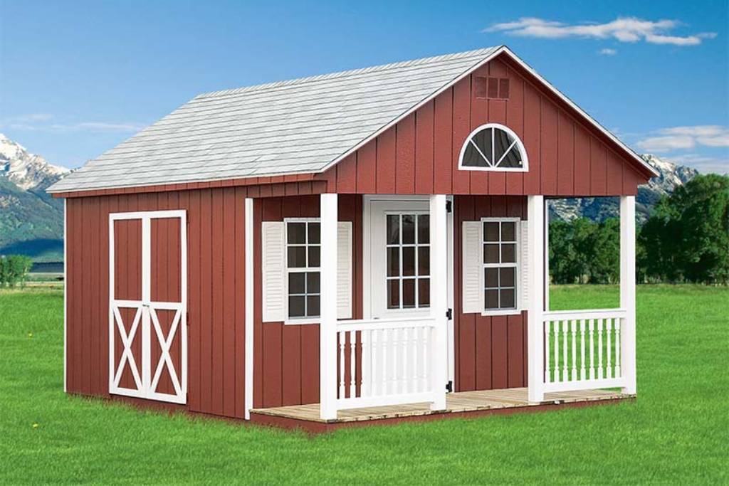 Red and white rustic storage shed on lawn